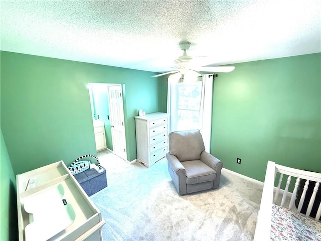 4531 Anderson St, Shawnee, KS 66226 - bedroom featuring light colored carpet, a textured ceiling, and a ceiling fan
