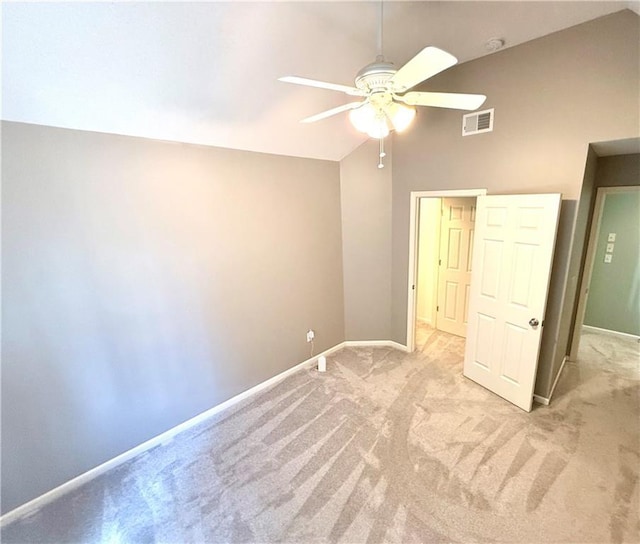 4531 Anderson St, Shawnee, KS 66226 - unfurnished bedroom featuring light carpet, lofted ceiling, and ceiling fan