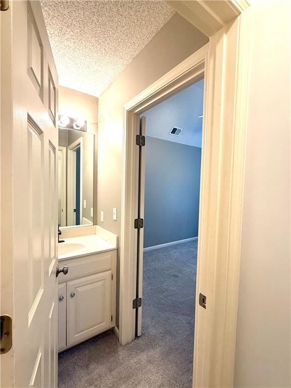 4531 Anderson St, Shawnee, KS 66226 - bathroom featuring vanity and a textured ceiling