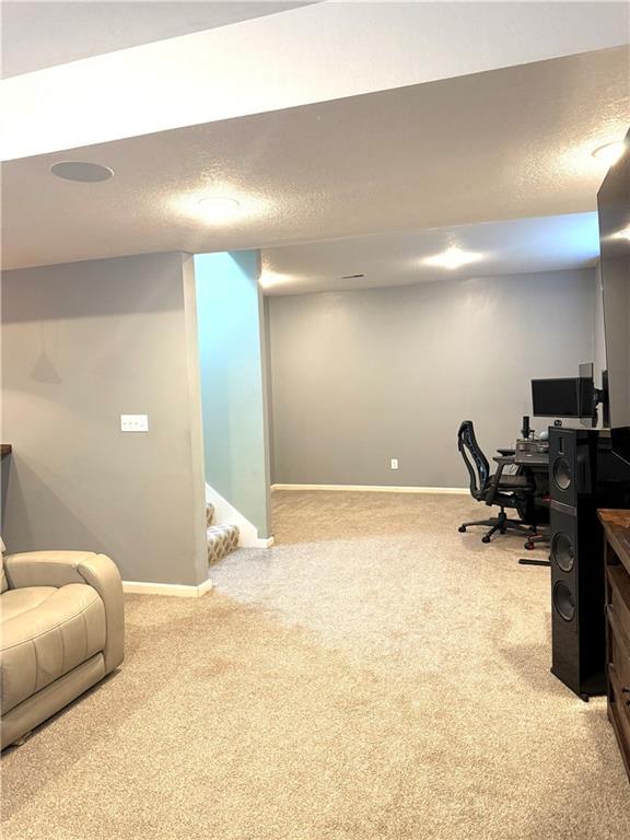 4531 Anderson St, Shawnee, KS 66226 - carpeted office space with a textured ceiling