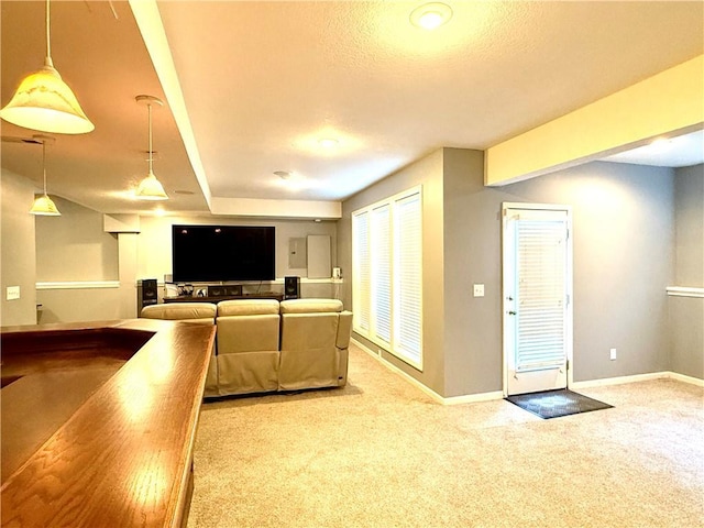 4531 Anderson St, Shawnee, KS 66226 - carpeted living area featuring baseboards and a textured ceiling