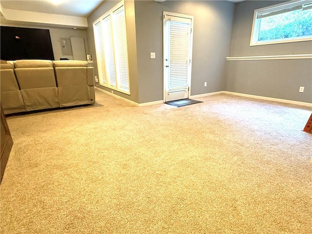 4531 Anderson St, Shawnee, KS 66226 - unfurnished living room with baseboards and carpet floors