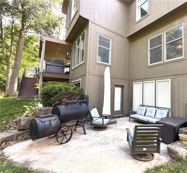 4531 Anderson St, Shawnee, KS 66226 - view of patio featuring an outdoor living space and stairway