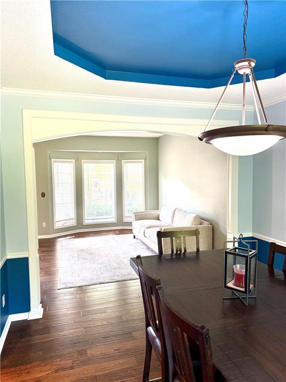 4531 Anderson St, Shawnee, KS 66226 - dining area featuring hardwood / wood-style floors and ornamental molding