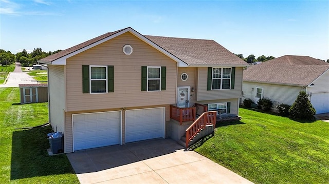 127 Hondo St, Lathrop, MO 64465 - bi-level home featuring driveway, an attached garage, and a front yard