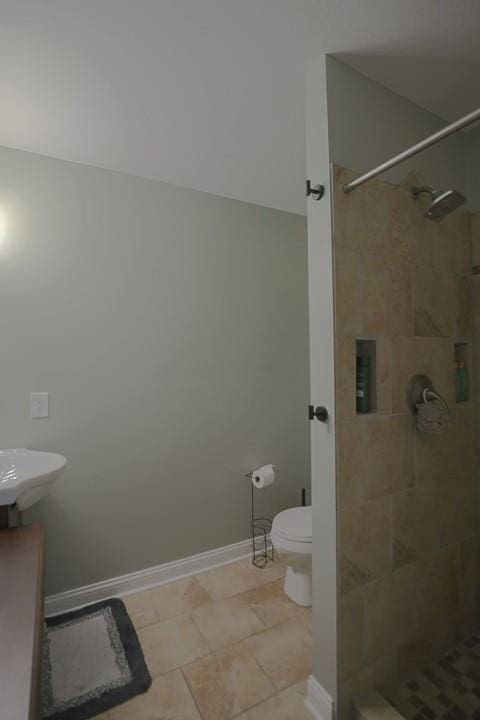 127 Hondo St, Lathrop, MO 64465 - bathroom with tiled shower and vanity