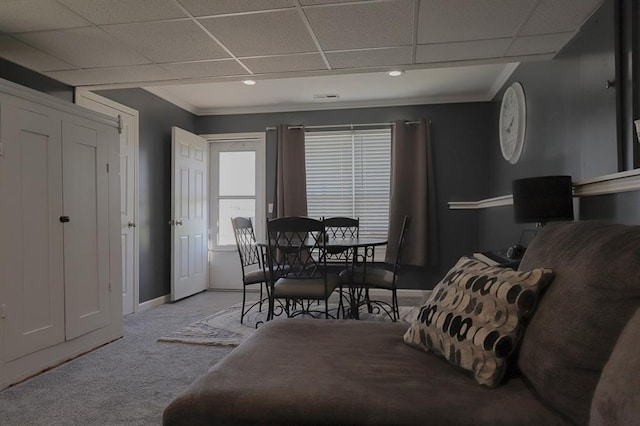 127 Hondo St, Lathrop, MO 64465 - dining area featuring carpet flooring, a drop ceiling, and crown molding