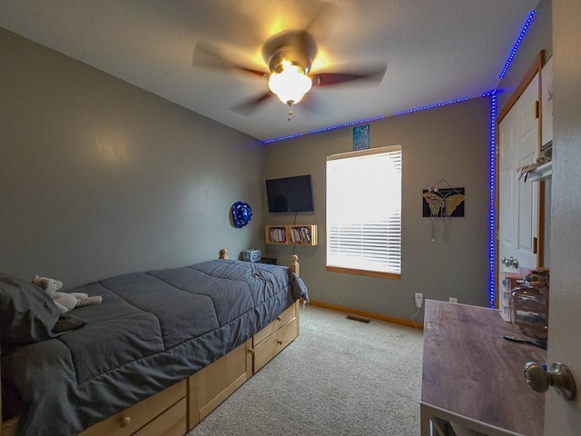 127 Hondo St, Lathrop, MO 64465 - bedroom with carpet flooring and ceiling fan