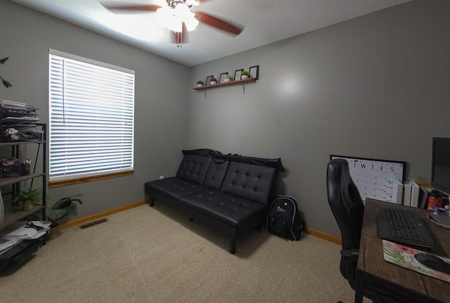 127 Hondo St, Lathrop, MO 64465 - office area featuring ceiling fan, carpet floors, and healthy amount of natural light