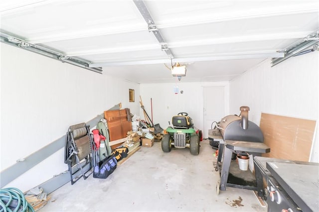 516 W 7th St, Carrollton, MO 64633 - garage featuring a garage door opener