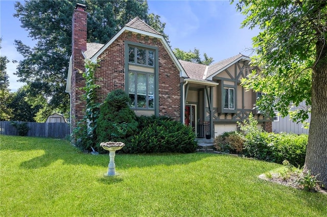 11579 Earnshaw St, Overland Park, KS 66210 - english style home with a chimney, stucco siding, brick siding, and a shingled roof