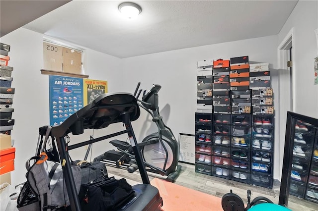 11579 Earnshaw St, Overland Park, KS 66210 - exercise room with wood finished floors