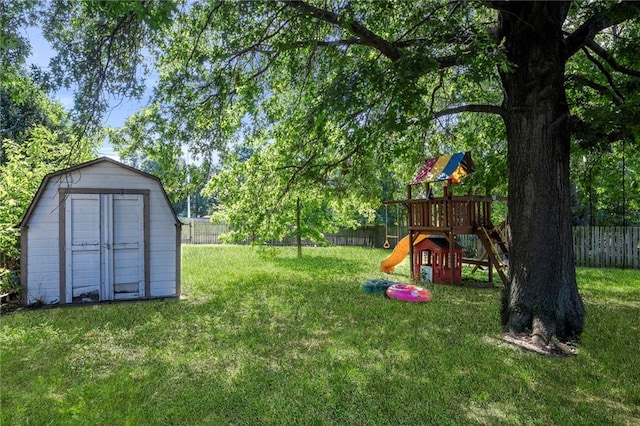 11579 Earnshaw St, Overland Park, KS 66210 - fenced backyard with a storage unit and a playground