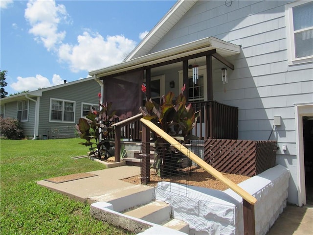 706 W 10th St, Sedalia, MO 65301 - entrance to property featuring a yard