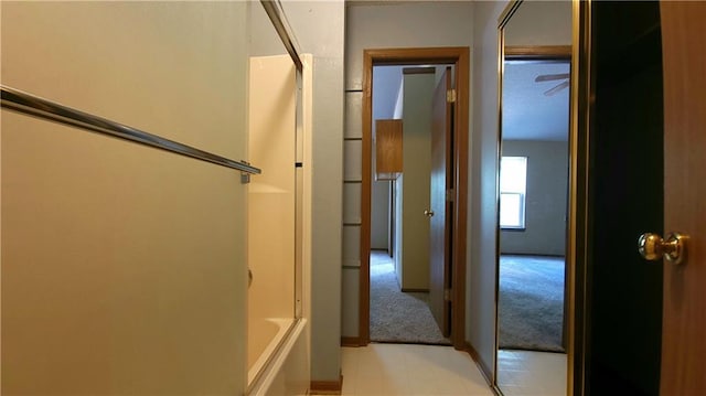 2604 S Peck Ct Unit B, Independence, MO 64055 - bathroom with shower / bathtub combination and baseboards