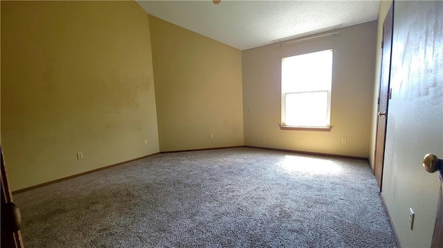 2604 S Peck Ct Unit B, Independence, MO 64055 - empty room with carpet floors and a textured ceiling