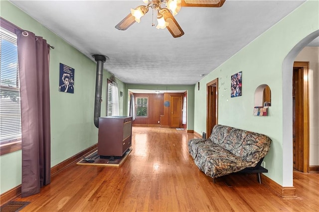 1234 S Pearl St, Independence, MO 64055 - hall with arched walkways and wood finished floors