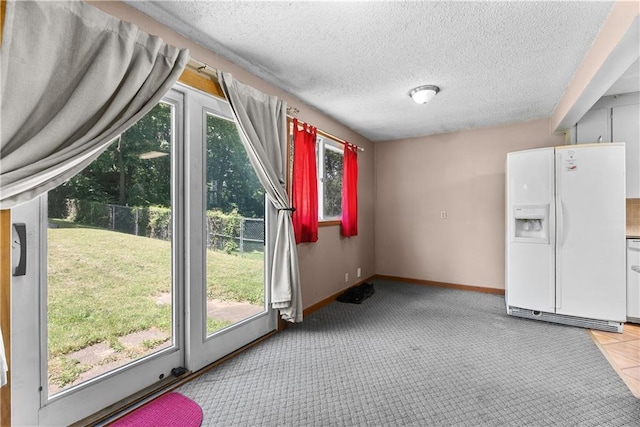 1234 S Pearl St, Independence, MO 64055 - interior space featuring a textured ceiling and carpet