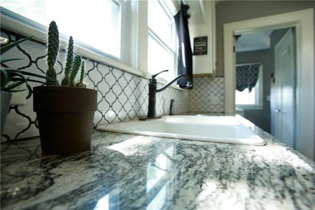 383 E Broadway St, Peculiar, MO 64078 - bathroom with a sink and a tub to relax in