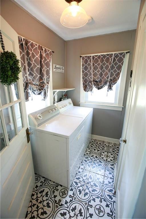 383 E Broadway St, Peculiar, MO 64078 - washroom with washing machine and dryer and tile patterned floors