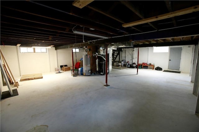 383 E Broadway St, Peculiar, MO 64078 - below grade area featuring gas water heater and heating unit