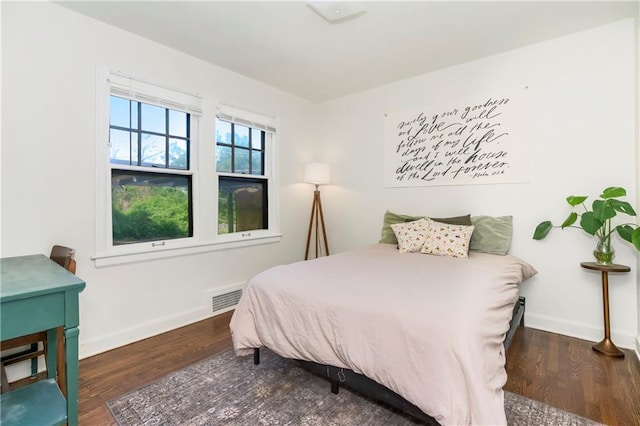 6347 Sni A Bar Rd, Kansas City, MO 64129 - bedroom with wood finished floors and baseboards