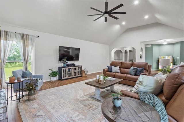 1803 N Jeter Rd, Raymore, MO 64083 - living area with ceiling fan, wood finished floors, vaulted ceiling, and recessed lighting