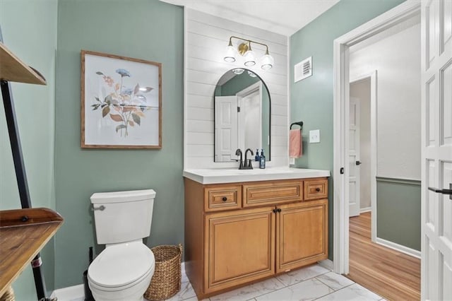 1803 N Jeter Rd, Raymore, MO 64083 - bathroom with vanity and marble look tiles