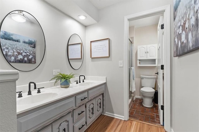 1803 N Jeter Rd, Raymore, MO 64083 - full bath with a stall shower and double vanity