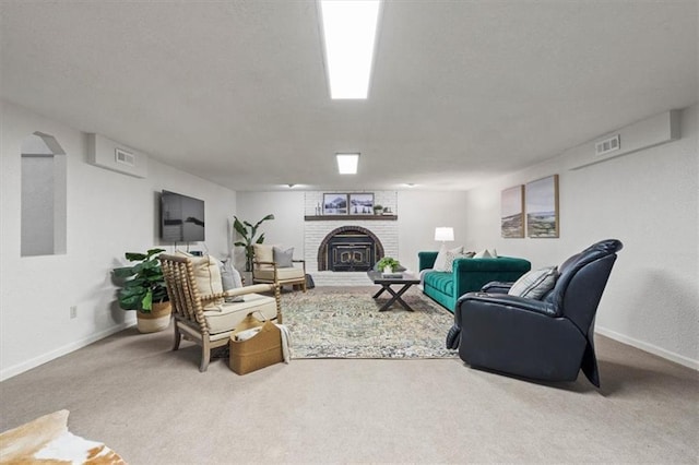 1803 N Jeter Rd, Raymore, MO 64083 - carpeted living room with baseboards and a brick fireplace