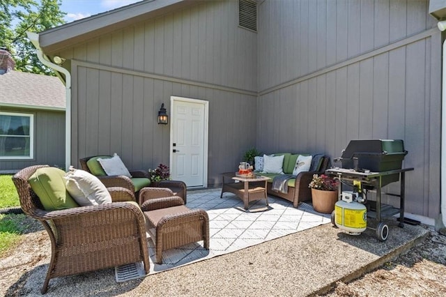 1803 N Jeter Rd, Raymore, MO 64083 - view of patio / terrace featuring an outdoor hangout area and grilling area