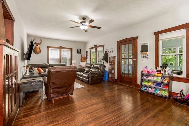 327 Parker Ave, Osawatomie, KS 66064 - living area with wood finished floors and ceiling fan