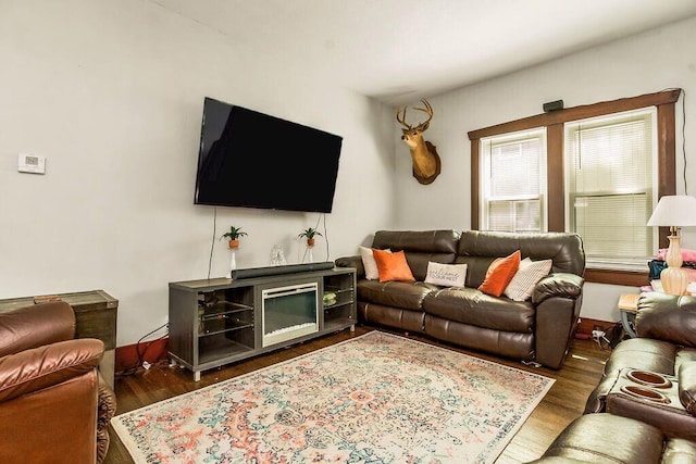 327 Parker Ave, Osawatomie, KS 66064 - living area featuring wood finished floors