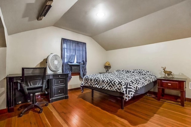 327 Parker Ave, Osawatomie, KS 66064 - bedroom featuring wood-type flooring and lofted ceiling