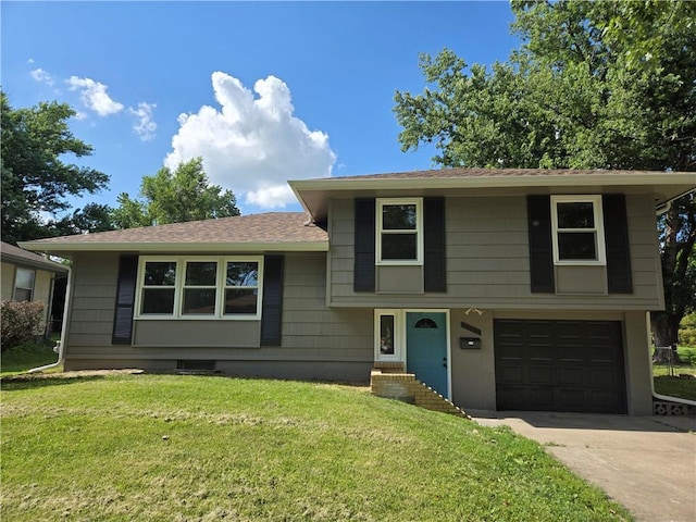 6302 E 120th Ter, Grandview, MO 64030 - split level home with an attached garage, driveway, a front yard, and roof with shingles