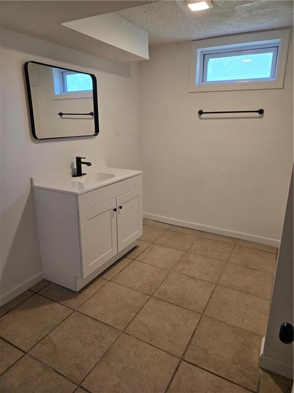 6302 E 120th Ter, Grandview, MO 64030 - bathroom featuring vanity and tile patterned flooring