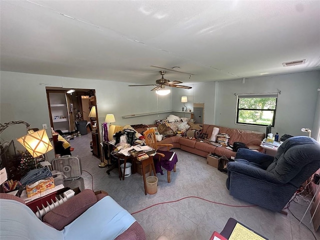2332 Park Ln, Oak Grove, MO 64075 - carpeted living room with ceiling fan