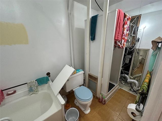 2332 Park Ln, Oak Grove, MO 64075 - bathroom featuring toilet and a stall shower