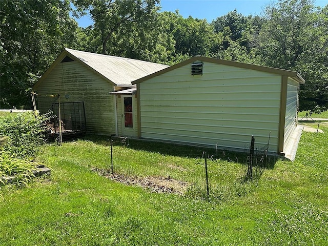 2332 Park Ln, Oak Grove, MO 64075 - view of side of property with a lawn