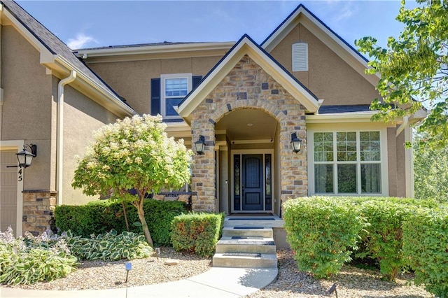 9445 W 157th Pl, Overland Park, KS 66221 - entrance to property with stone siding and stucco siding