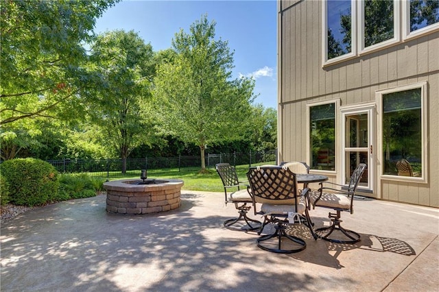 9445 W 157th Pl, Overland Park, KS 66221 - view of patio / terrace with a fire pit and outdoor dining area