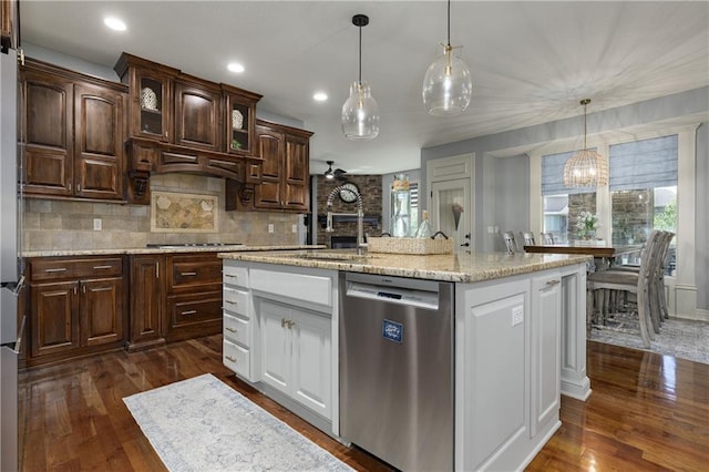 9445 W 157th Pl, Overland Park, KS 66221 - kitchen featuring stainless steel dishwasher, cooktop, dark wood-style floors, white cabinetry, and recessed lighting