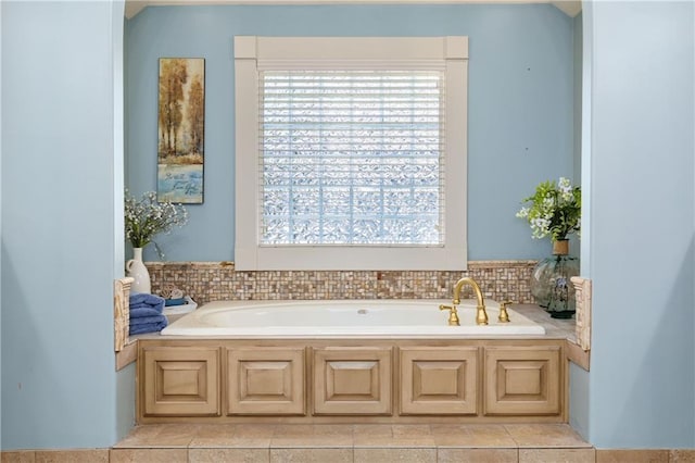 9445 W 157th Pl, Overland Park, KS 66221 - bathroom with healthy amount of natural light, a garden tub, and tile patterned floors