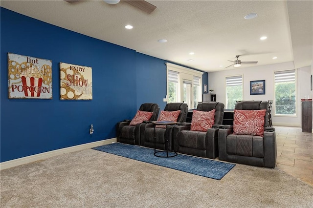 9445 W 157th Pl, Overland Park, KS 66221 - home theater featuring a ceiling fan, recessed lighting, carpet flooring, and a textured ceiling