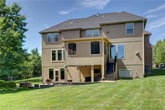 9445 W 157th Pl, Overland Park, KS 66221 - rear view of property featuring stairs and roof with shingles