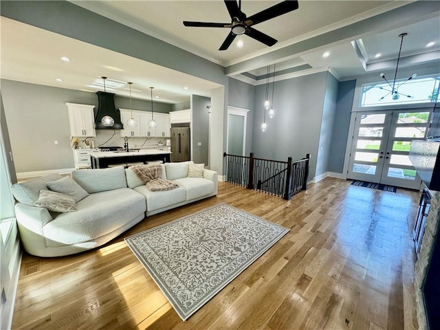 5443 N 101st Ter, Kansas City, KS 66109 - living area with french doors, ornamental molding, light wood-style flooring, recessed lighting, and ceiling fan