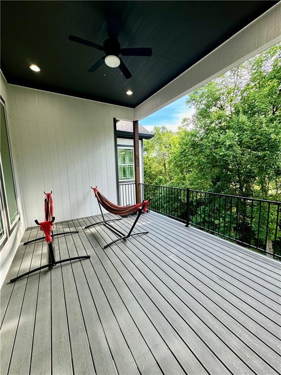 5443 N 101st Ter, Kansas City, KS 66109 - wooden terrace with ceiling fan