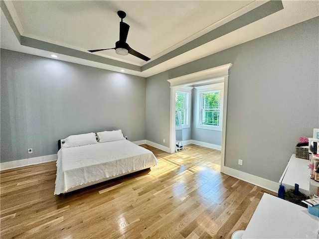 5443 N 101st Ter, Kansas City, KS 66109 - bedroom featuring a raised ceiling, wood finished floors, a ceiling fan, and recessed lighting