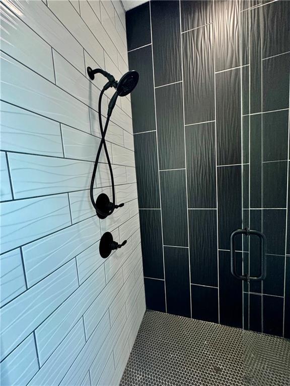 5443 N 101st Ter, Kansas City, KS 66109 - full bathroom with a stall shower