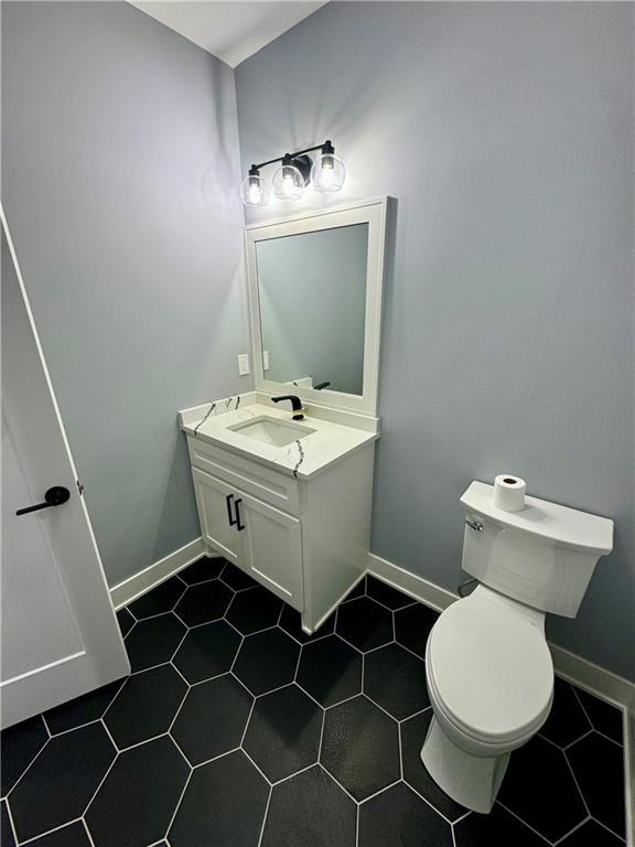 5443 N 101st Ter, Kansas City, KS 66109 - bathroom featuring vanity and tile patterned floors